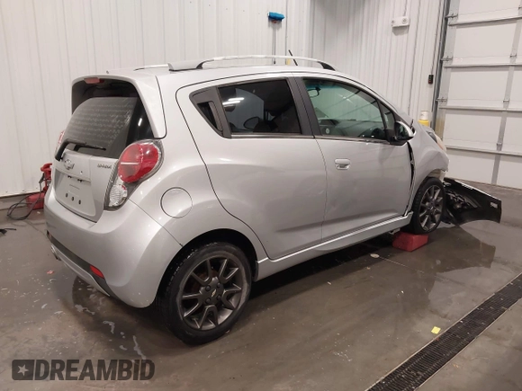 2013 Chevrolet Spark LT with VIN KL8CF6S99DC514212, listed as a IAAI auction lot 42052664 with 130,320 mi miles and . Bid and sale history available at DreamBid. Image 4.