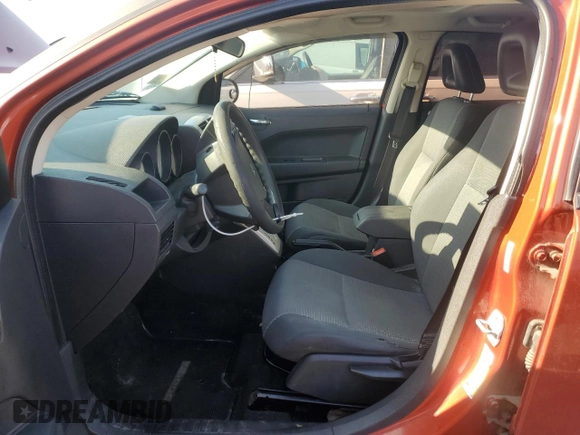 2009 Dodge Caliber SXT with VIN 1B3HB48A89D119892, listed as a Copart auction lot 52505545 with 219,227 mi miles and Salvage Title. Bid and sale history available at carsss.com. Image 7.