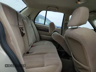 2004 Mercury Grand Marquis GS with VIN 2MEFM74W44X659873, listed as a Copart auction lot 51793205 with 115,384 mi miles and Salvage Title. Bid and sale history available at DreamBid. Image 10.