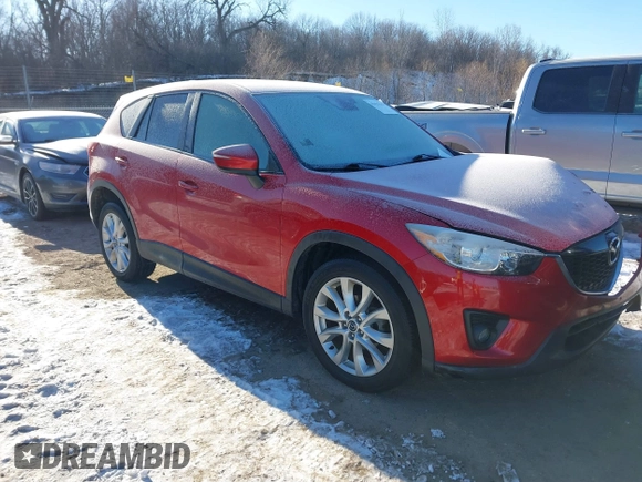 2015 Mazda CX-5 Grand Touring with VIN JM3KE4DY0F0538246, listed as a IAAI auction lot 41629662 with 87,788 mi miles. Bid and sale history available at carsss.com. Image 1.