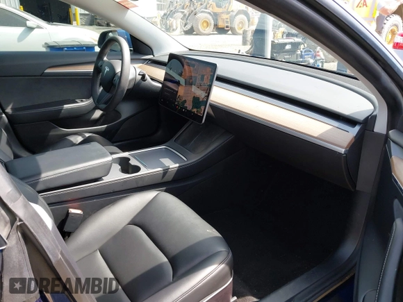 2021 Tesla Model 3 Performance with VIN 5YJ3E1EC1MF000961, listed as a IAAI auction lot 42110524 with 31,890 mi miles and . Bid and sale history available at carsss.com. Image 5.