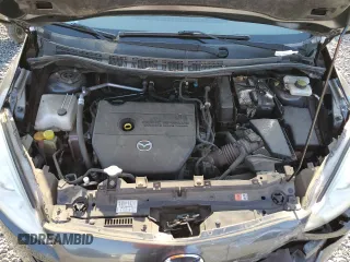 2014 Mazda 5 Sport с VIN JM1CW2BL2E0167630, выставлен на аукционе Copart как лот 54394195 с пробегом 79 034 миль миль и Списание • Salvage title. История ставок и продаж доступна на DreamBid. Изображение 11.