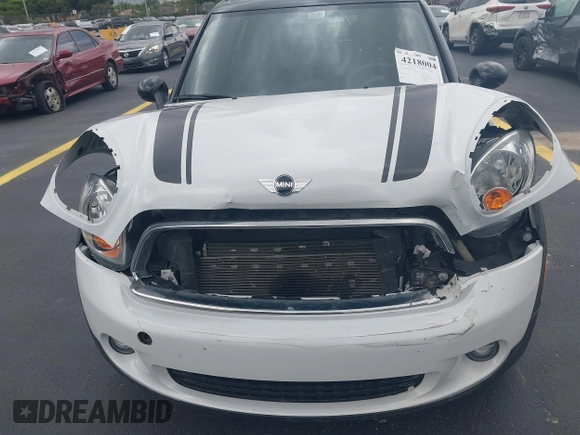 2012 MINI Countryman z VIN WMWZB3C56CWM04087, wystawiony jako IAAI lot #42180040 z przebiegiem 37 789 mil mil oraz . Historia ofert i sprzedaży dostępna na DreamBid. Obrazek 6.