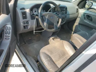 2002 Ford Escape XLS Choice z VIN 1FMYU01102KB13125, wystawiony jako Copart lot #59034495 z przebiegiem 202 253 mil mil oraz Szkoda całkowita • Salvage title. Historia ofert i sprzedaży dostępna na DreamBid. Obrazek 8.