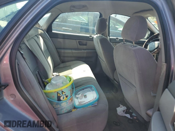 2006 Ford Taurus SE with VIN 1FAFP53U36A262525, listed as a Copart auction lot 86797374 with 179,508 mi miles and Salvage title. Bid and sale history available at DreamBid. Image 11.