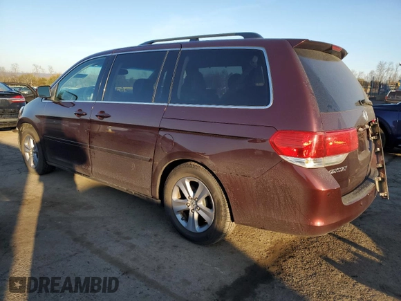 2010 Honda Odyssey Touring with VIN 5FNRL3H93AB086488, listed as a Copart auction lot 48660505 with 190,333 mi miles and Salvage Title. Bid and sale history available at carsss.com. Image 2.