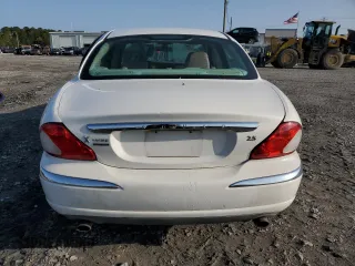 2005 Jaguar X-Type z VIN SAJWB52D55XE26531, wystawiony jako Copart lot #50909445 z przebiegiem 158 861 mil mil oraz Szkoda całkowita • Salvage title. Historia ofert i sprzedaży dostępna na DreamBid. Obrazek 6.