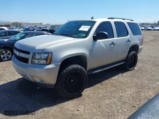 2007 Chevrolet Tahoe LT with VIN 1GNFC13JX7R132823, listed as a IAAI auction lot 41824219 with 1 mi miles. Bid and sale history available at carsss.com. Image 2.