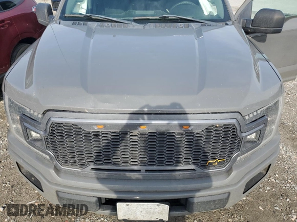2020 Ford F-150 XL with VIN 1FTEW1CP3LFA33644, listed as a Copart auction lot 57151375 with 125,885 mi miles and Salvage title. Bid and sale history available at DreamBid. Image 11.