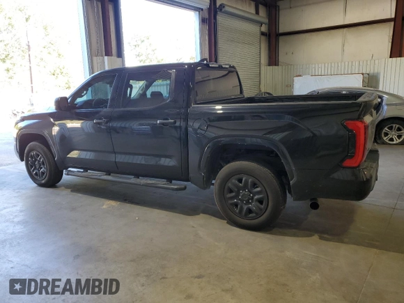 2023 Toyota Tundra SR z VIN 5TFKB5DB8PX113093, wystawiony jako Copart lot #80488324 z przebiegiem 24 200 mil mil oraz Szkoda całkowita • Salvage title. Historia ofert i sprzedaży dostępna na DreamBid. Obrazek 2.