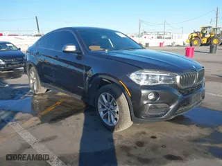 2019 BMW X6 sDrive35i with VIN 5UXKU0C57K0S97581, listed as a IAAI auction lot 41322568 with 76,635 mi miles. Bid and sale history available at carsss.com. Image 1.