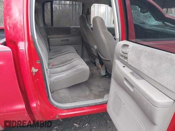 2002 Dodge Dakota Sport with VIN 1B7HG38N52S510495, listed as a IAAI auction lot 41694757 with 254,713 mi miles. Bid and sale history available at carsss.com. Image 8.