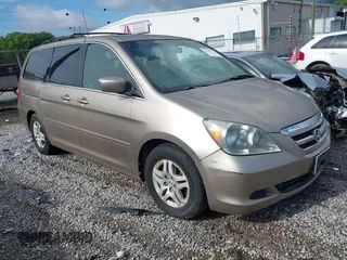 2005 Honda Odyssey EX-L z VIN 5FNRL38745B121849, wystawiony jako IAAI lot #42147231 z przebiegiem 223 484 mil mil oraz . Historia ofert i sprzedaży dostępna na DreamBid. Obrazek 1.