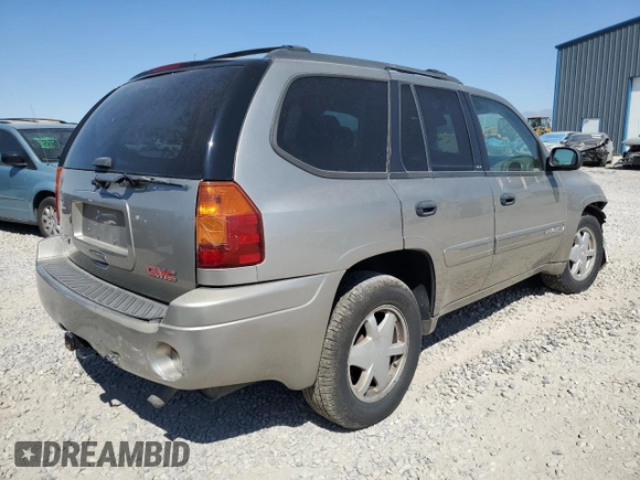 2002 GMC Envoy SLE with VIN 1GKDS13S222376922, listed as a Copart auction lot 69820804 with 246,224 mi miles and Salvage Title. Bid and sale history available at carsss.com. Image 3.