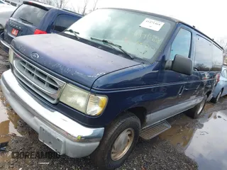 2002 Ford Econoline Passenger XL with VIN 1FMRE11L02HB30156, listed as a IAAI auction lot 41471468 with 128,320 mi miles and . Bid and sale history available at DreamBid. Image 2.