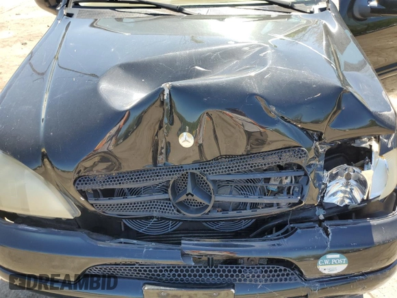 2001 Mercedes-Benz M-Class with VIN 4JGAB54E61A232157, listed as a Copart auction lot 53482584 with 137,549 mi miles and Salvage Title. Bid and sale history available at carsss.com. Image 13.