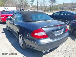 2009 Mercedes-Benz CLK-Class 3.5L with VIN WDBTK56FX9T108975, listed as a IAAI auction lot 41884199 with 121,764 mi miles. Bid and sale history available at carsss.com. Image 3.