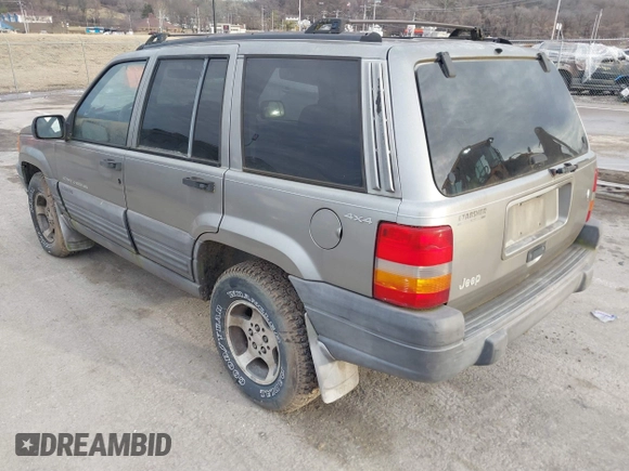 1997 Jeep Grand Cherokee Laredo with VIN 1J4GZ58S4VC745129, listed as a IAAI auction lot 41641005 with 1 mi miles. Bid and sale history available at carsss.com. Image 3.