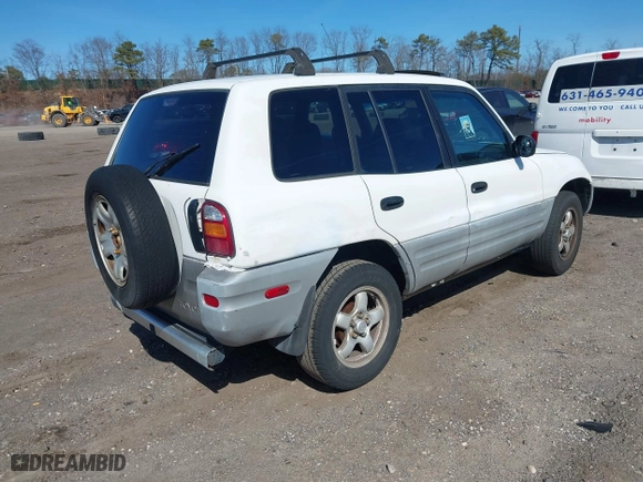 1998 Toyota RAV4 with VIN JT3GP10V9W7038486, listed as a IAAI auction lot 41778465 with 157,143 mi miles. Bid and sale history available at carsss.com. Image 4.