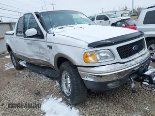 2002 Ford F-150 XLT with VIN 1FTRW08L12KA67332, listed as a IAAI auction lot 41617397 with 41,099 mi miles. Bid and sale history available at carsss.com. Image 1.