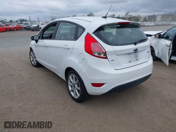 2019 Ford Fiesta SE with VIN 3FADP4EJXKM143274, listed as a IAAI auction lot 42124127 with 85,525 mi miles. Bid and sale history available at carsss.com. Image 3.