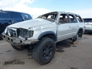 1998 Toyota 4Runner SR5 z VIN JT3HN86R2W0172312, wystawiony jako IAAI lot #42214433 z przebiegiem 259 170 mil mil oraz . Historia ofert i sprzedaży dostępna na DreamBid. Obrazek 6.
