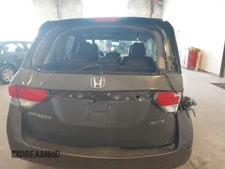 2014 Honda Odyssey Touring with VIN 5FNRL5H99EB105059, listed as a IAAI auction lot 42457672 with 240,581 mi miles and . Bid and sale history available at DreamBid. Image 6.