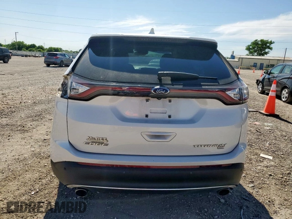 2017 Ford Edge Titanium z VIN 2FMPK4K87HBC26173, wystawiony jako Copart lot #58070565 z przebiegiem 63 989 mil mil oraz Szkoda całkowita • Salvage title. Historia ofert i sprzedaży dostępna na DreamBid. Obrazek 6.