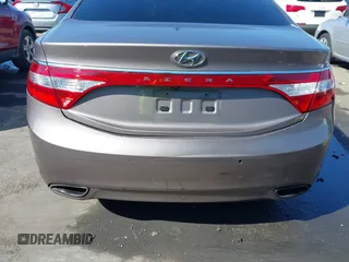 2013 Hyundai Azera with VIN KMHFH4JG2DA256481, listed as a IAAI auction lot 41673405 with 180,130 mi miles and . Bid and sale history available at DreamBid. Image 6.