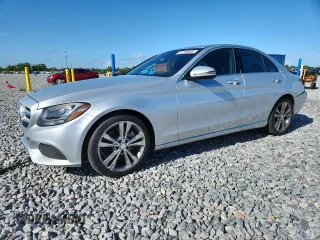 2018 Mercedes-Benz C 300 with VIN 55SWF4JB5JU259505, listed as a Copart auction lot 62457115 with 136,580 mi miles and Salvage title. Bid and sale history available at DreamBid. Image 1.