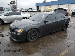 2012 Chrysler 300 SRT8 with VIN 2C3CCAFJ0CH801090, listed as a Copart auction lot 86537394 with 126,439 mi miles and Clean Title. Bid and sale history available at carsss.com. Image 1.
