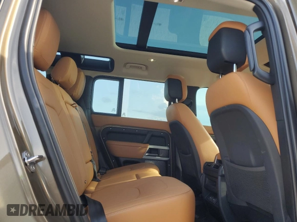 2024 Land Rover Defender S with VIN SALEJ7EU2R2272955, listed as a Copart auction lot 66796994 with 9,079 mi miles and Salvage title. Bid and sale history available at DreamBid. Image 11.