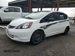 2009 Honda Fit with VIN JHMGE88259C001997, listed as a Copart auction lot 63022185 with 121,169 mi miles and Salvage title. Bid and sale history available at DreamBid. Image 1.