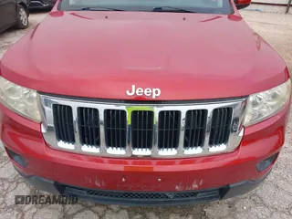 2011 Jeep Grand Cherokee Laredo with VIN 1J4RS4GG1BC673290, listed as a IAAI auction lot 42042557 with 147,590 mi miles and . Bid and sale history available at DreamBid. Image 6.