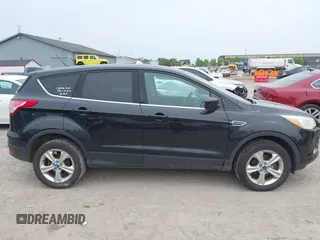 2013 Ford Escape SE z VIN 1FMCU9G99DUC90792, wystawiony jako IAAI lot #42501513 z przebiegiem 207 590 mil mil oraz . Historia ofert i sprzedaży dostępna na DreamBid. Obrazek 14.