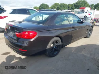 2014 BMW 4 Series 428i with VIN WBA3V5C50EP751257, listed as a IAAI auction lot 42431133 with 99,070 mi miles and . Bid and sale history available at DreamBid. Image 4.