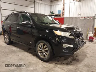 2011 Kia Sorento SX with VIN 5XYKWDA21BG163591, listed as a IAAI auction lot 42287173 with 163,316 mi miles and . Bid and sale history available at DreamBid. Image 1.