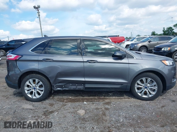 2021 Ford Edge Titanium z VIN 2FMPK3K9XMBA21766, wystawiony jako IAAI lot #42187940 z przebiegiem 79 732 mil mil oraz . Historia ofert i sprzedaży dostępna na DreamBid. Obrazek 13.