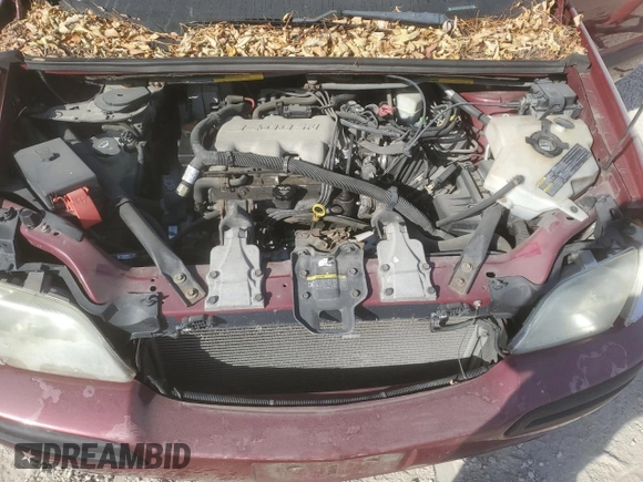 2004 Chevrolet Venture LS z VIN 1GNDX03E34D232151, wystawiony jako Copart lot #77205384 z przebiegiem 151 035 mil mil oraz Szkoda całkowita • Salvage title. Historia ofert i sprzedaży dostępna na DreamBid. Obrazek 13.