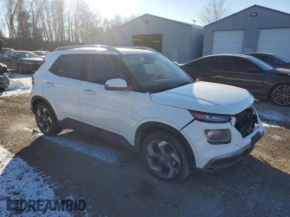 2024 Hyundai Venue SEL with VIN KMHRC8A39RU290214, listed as a Copart auction lot 82413604 with 52,988 mi miles and Salvage Title. Bid and sale history available at DreamBid. Image 4.