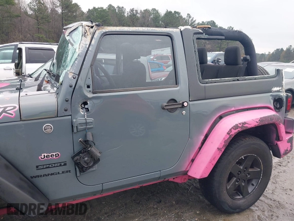 2015 Jeep Wrangler Sport with VIN 1C4AJWAG3FL589214, listed as a IAAI auction lot 41056259 with 101,758 mi miles and . Bid and sale history available at DreamBid. Image 14.