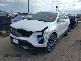 2024 Cadillac XT4 FWD Sport with VIN 1GYFZER48RF180481, listed as a IAAI auction lot 41093587 with 3,982 mi miles and . Bid and sale history available at DreamBid. Image 2.
