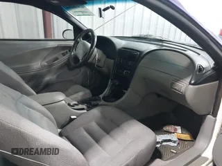 1998 Ford Mustang with VIN 1FAFP404XWF175772, listed as a IAAI auction lot 42686695 with 125,920 mi miles and . Bid and sale history available at DreamBid. Image 5.