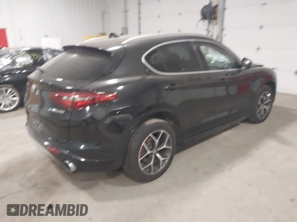 2020 Alfa Romeo Stelvio Ti z VIN ZASPAKBN5L7C91663, wystawiony jako IAAI lot #41816765 z przebiegiem 40 972 mil mil oraz . Historia ofert i sprzedaży dostępna na DreamBid. Obrazek 4.