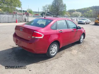 2010 Ford Focus SE with VIN 1FAHP3FN1AW103645, listed as a IAAI auction lot 42111611 with 157,125 mi miles and . Bid and sale history available at DreamBid. Image 4.