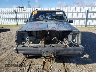 1995 Jeep Cherokee Sport с VIN 1J4FJ68S5SL657646, выставлен на аукционе Copart как лот 82431114 с пробегом 211 538 миль миль и На запчасти • Non repairable. История ставок и продаж доступна на DreamBid. Изображение 5.