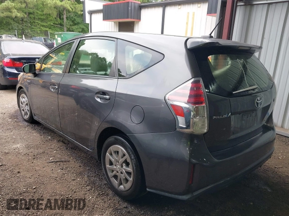 2015 Toyota Prius Two with VIN JTDZN3EU6FJ016826, listed as a IAAI auction lot 42662727 with 184,491 mi miles and . Bid and sale history available at DreamBid. Image 3.