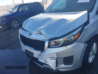 2016 Kia Sedona LX with VIN KNDMB5C18G6164472, listed as a IAAI auction lot 41661530 with 116,904 mi miles. Bid and sale history available at carsss.com. Image 6.