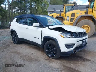 2021 Jeep Compass Altitude with VIN 3C4NJDBB5MT543426, listed as a IAAI auction lot 42124318 with 53,341 mi miles and . Bid and sale history available at DreamBid. Image 1.