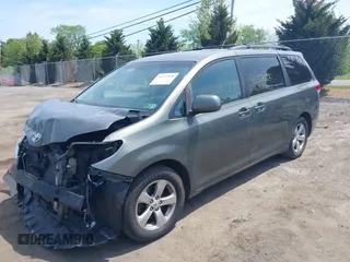2011 Toyota Sienna LE AAS with VIN 5TDKK3DC7BS014356, listed as a IAAI auction lot 42137928 with 198,400 mi miles and . Bid and sale history available at DreamBid. Image 2.